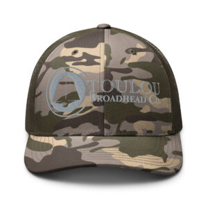 Complete your look with a Toulou Trucker Cap In Camo featuring a gray logo -- combine it with you favorite Toulou Tee, slacks, and hunting boots.
